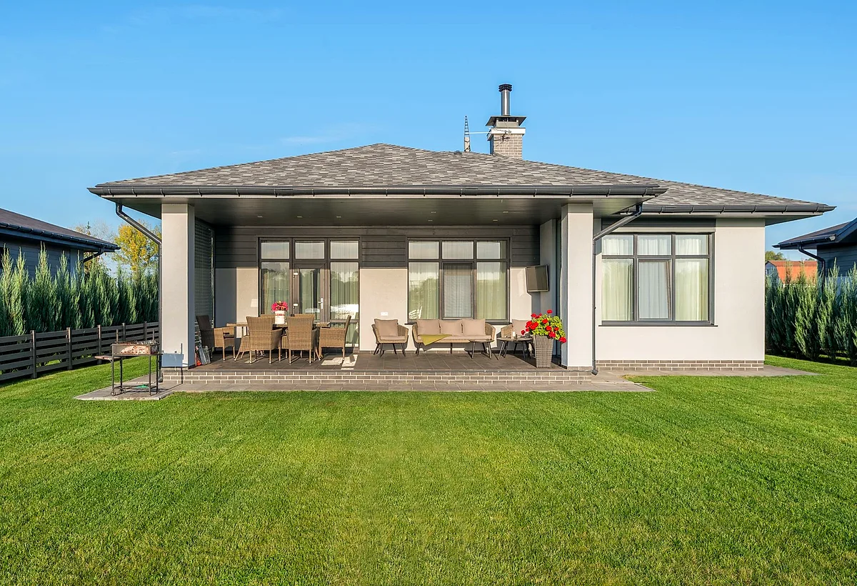 A tidy suburban home with a freshly cut lawn